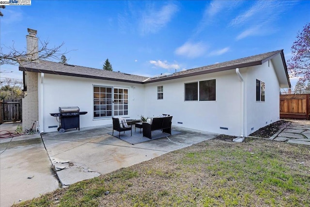 back of house with a patio and an outdoor hangout area