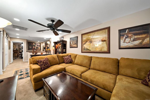 living room with light carpet and ceiling fan