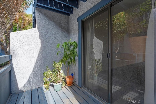 property entrance with a balcony