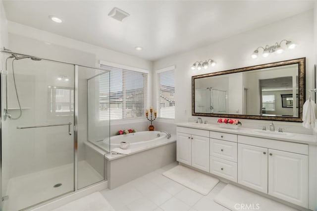 37845 Apache Plume Dr, Murrieta, CA 92563 - bathroom with a garden tub, double vanity, a stall shower, and recessed lighting