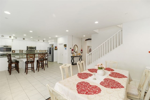 dining room with light tile patterned floors