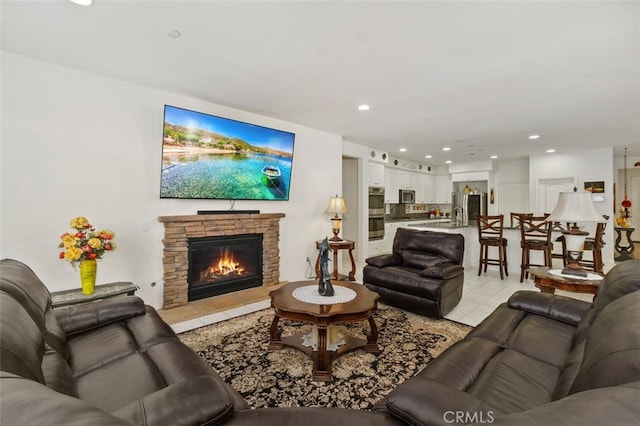 37845 Apache Plume Dr, Murrieta, CA 92563 - living area with light tile patterned floors, a fireplace, and recessed lighting