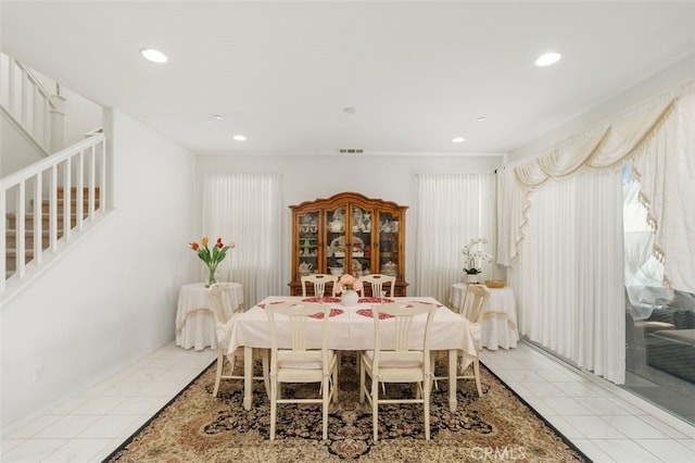 37845 Apache Plume Dr, Murrieta, CA 92563 - tiled dining room featuring stairway and recessed lighting