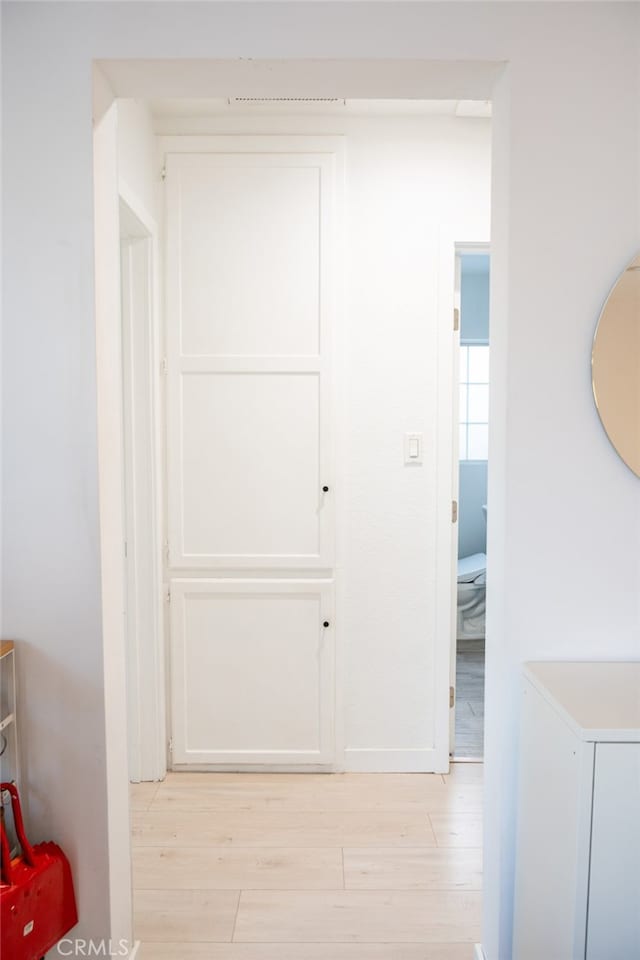 hallway featuring light wood-type flooring