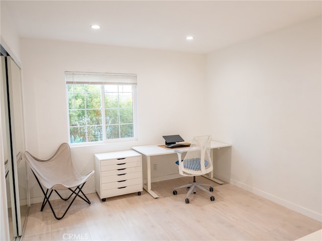 home office with light wood-type flooring