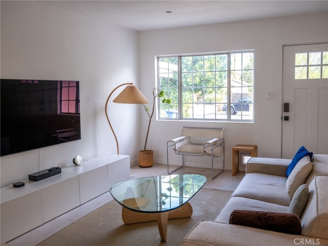 living room featuring a healthy amount of sunlight