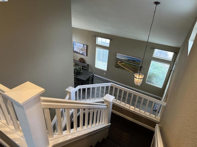 stairway with a baseboard radiator