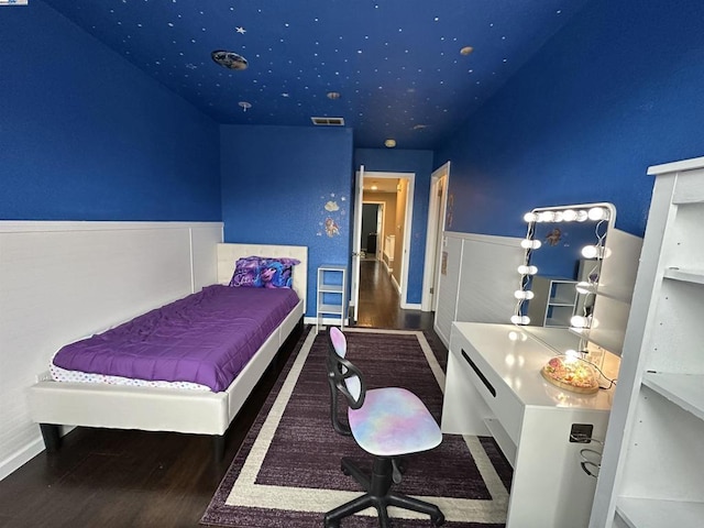 bedroom featuring dark hardwood / wood-style floors