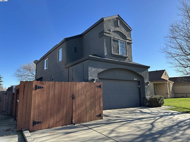 view of front of home with a garage