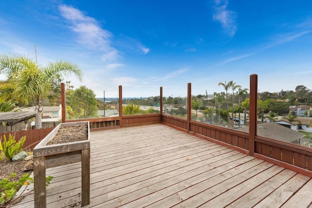 wooden terrace with a water view