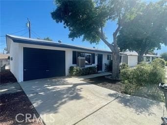 ranch-style home with a garage