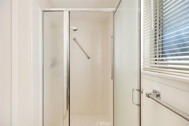 bathroom featuring an enclosed shower