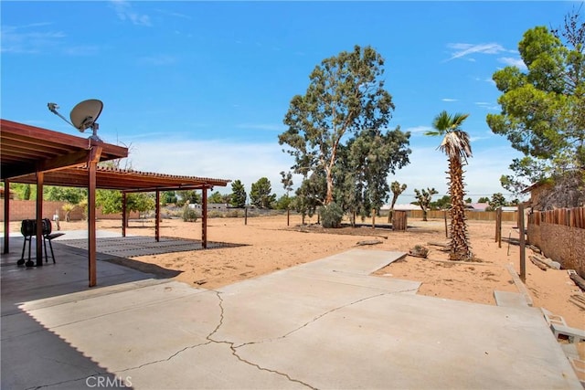 view of property's community with a patio