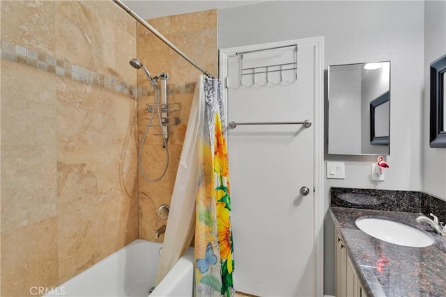 bathroom featuring vanity and shower / bath combination with curtain