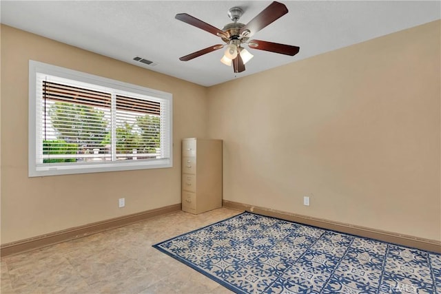 unfurnished room featuring ceiling fan