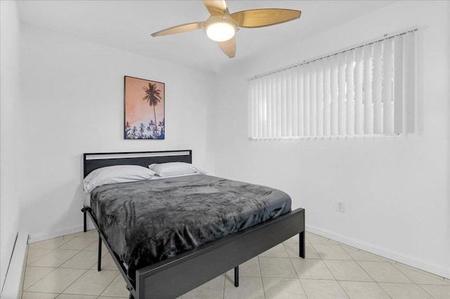 bedroom featuring ceiling fan and light tile patterned flooring