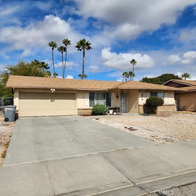 ranch-style home with a garage