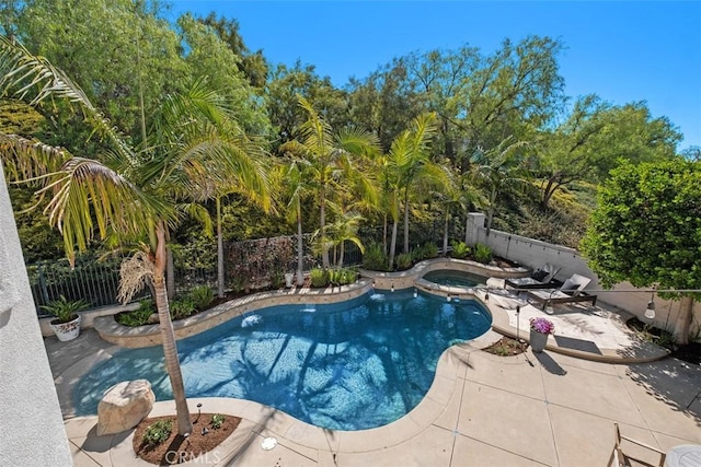 20 Bentley Rd, Coto De Caza, CA 92679 - view of pool with a fenced backyard, a patio area, and a pool with connected hot tub