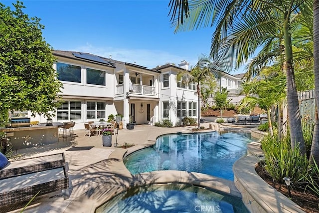 20 Bentley Rd, Coto De Caza, CA 92679 - view of pool featuring a ceiling fan, a patio, a pool with connected hot tub, and stairs