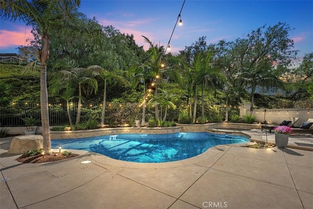 20 Bentley Rd, Coto De Caza, CA 92679 - pool at dusk featuring a patio area and a fenced backyard