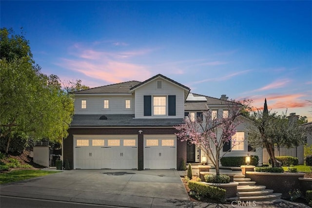 20 Bentley Rd, Coto De Caza, CA 92679 - traditional home featuring a garage and concrete driveway