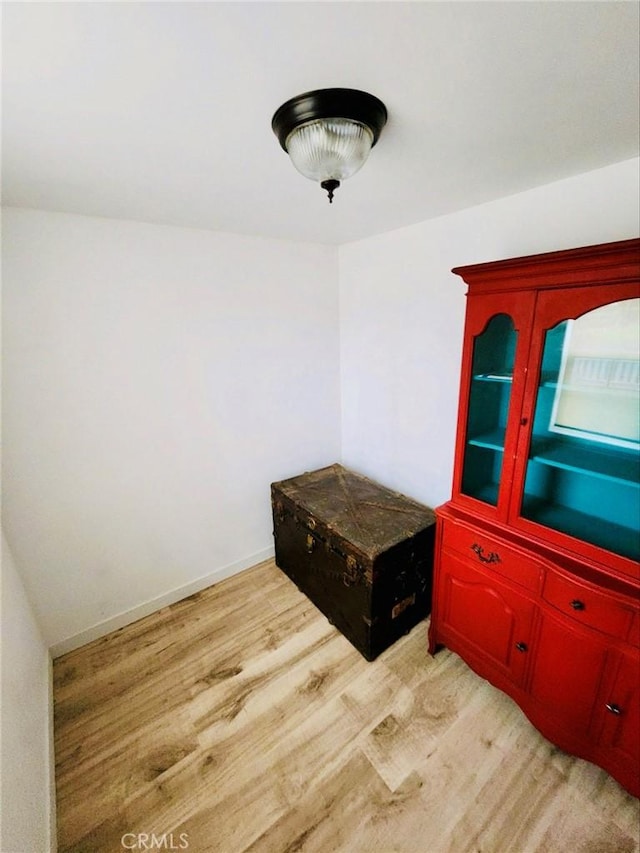 unfurnished room featuring light hardwood / wood-style floors