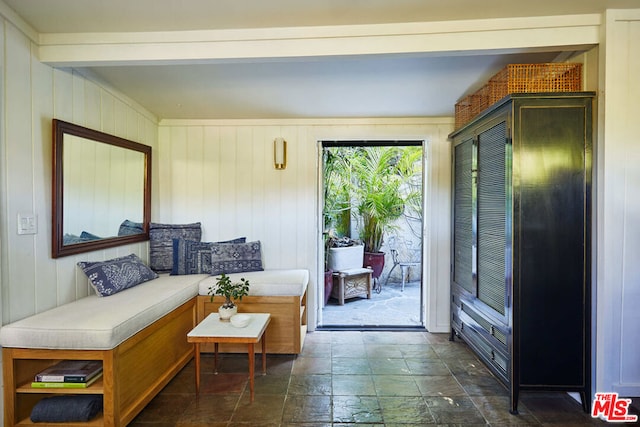 entryway with beam ceiling