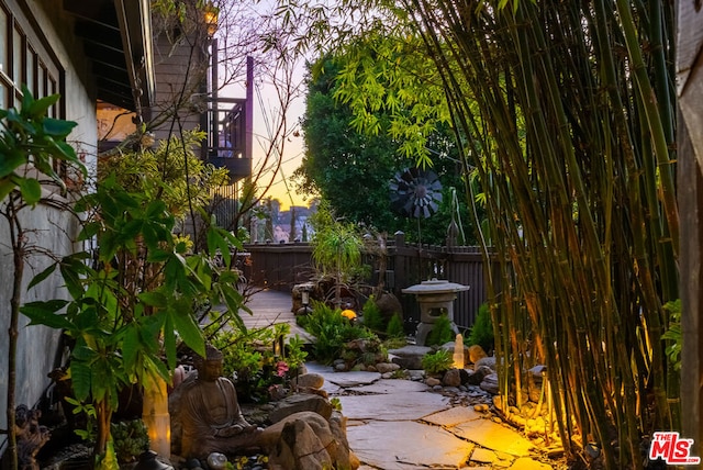 view of patio terrace at dusk