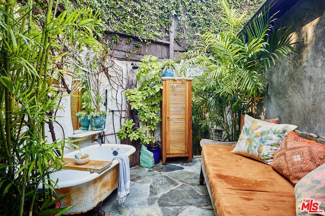 bathroom with a washtub