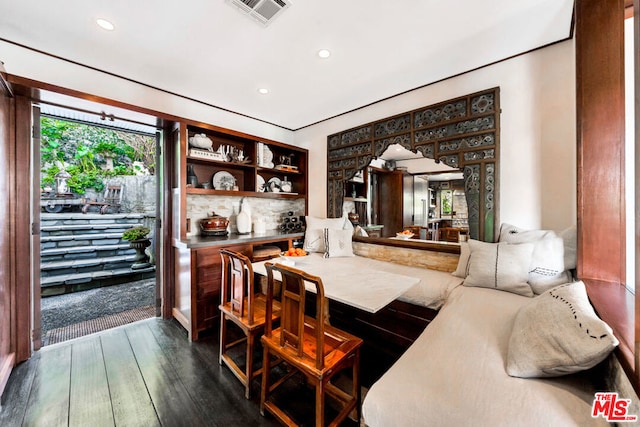 dining area with dark hardwood / wood-style floors