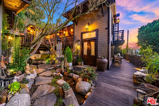 view of deck at dusk