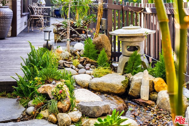 view of yard featuring a deck