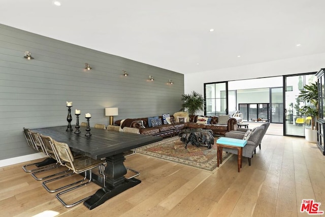 dining area with light hardwood / wood-style floors