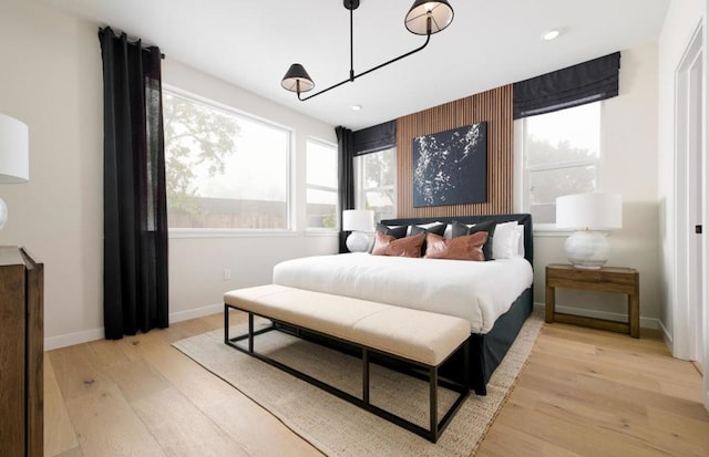 bedroom with light wood-type flooring