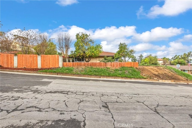 view of road with curbs