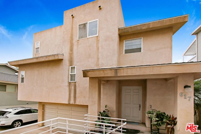 exterior space featuring a garage