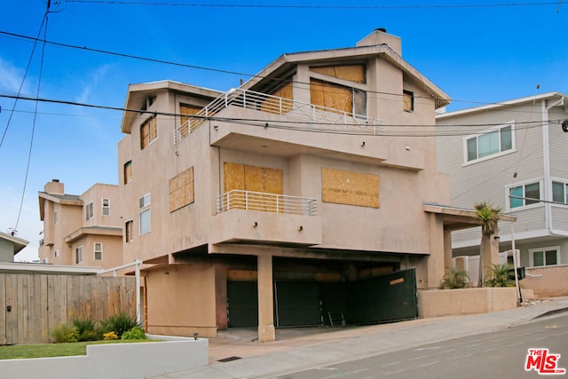 exterior space with a balcony