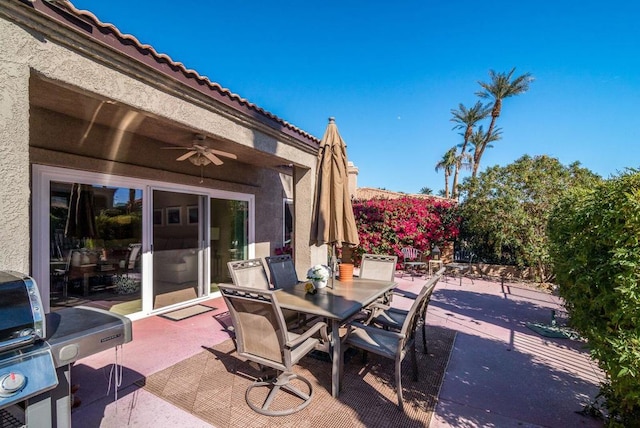 view of patio featuring ceiling fan