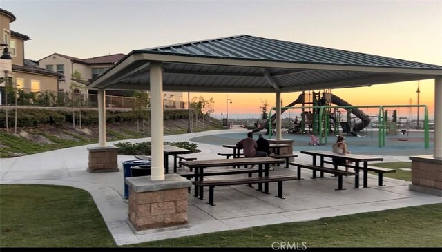 view of property's community with a gazebo and a playground