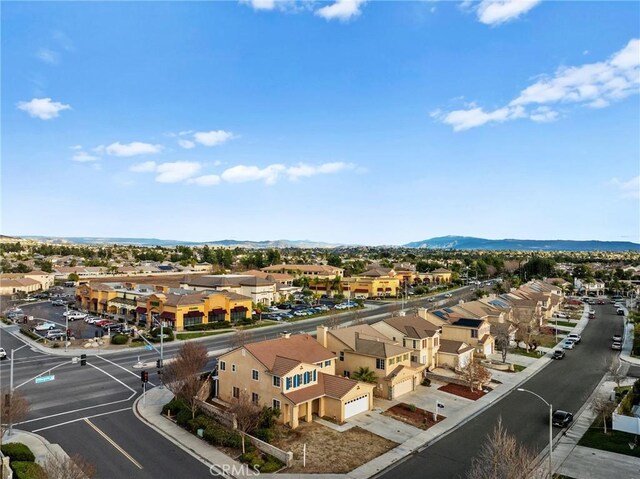 birds eye view of property featuring a residential view and a mountain view
