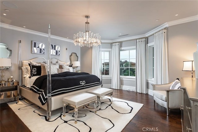 bedroom featuring hardwood / wood-style flooring, crown molding, and a notable chandelier