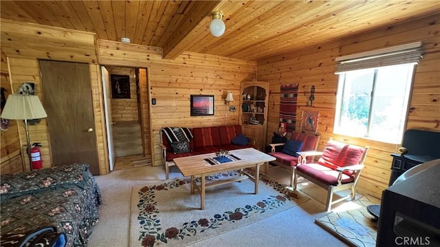 interior space with wooden walls, wooden ceiling, and beamed ceiling