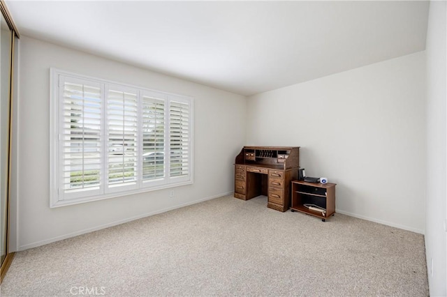 interior space featuring light carpet