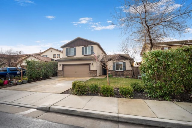 view of front of home featuring a garage and a front lawn