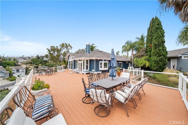 deck featuring outdoor dining space