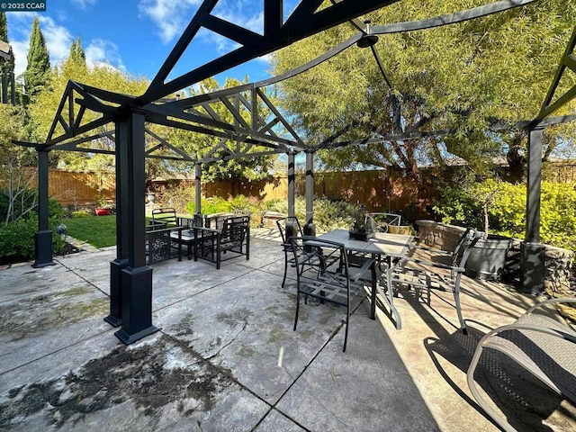 view of patio featuring a pergola