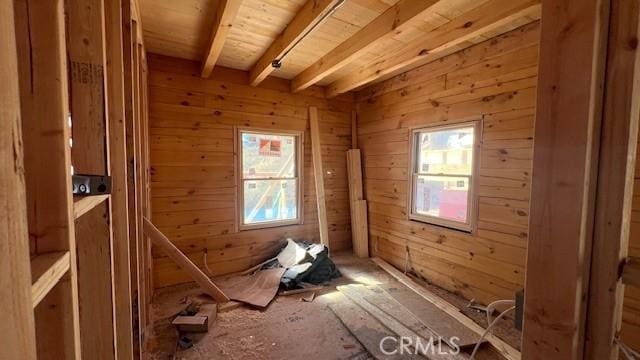 misc room featuring beam ceiling