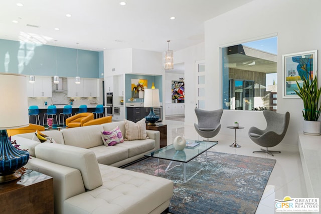 tiled living room with a towering ceiling