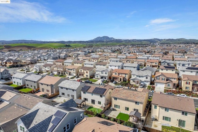 birds eye view of property featuring a mountain view