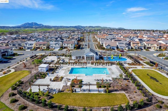 birds eye view of property featuring a mountain view